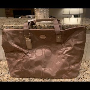 Coach tote with matching cosmetic bag
